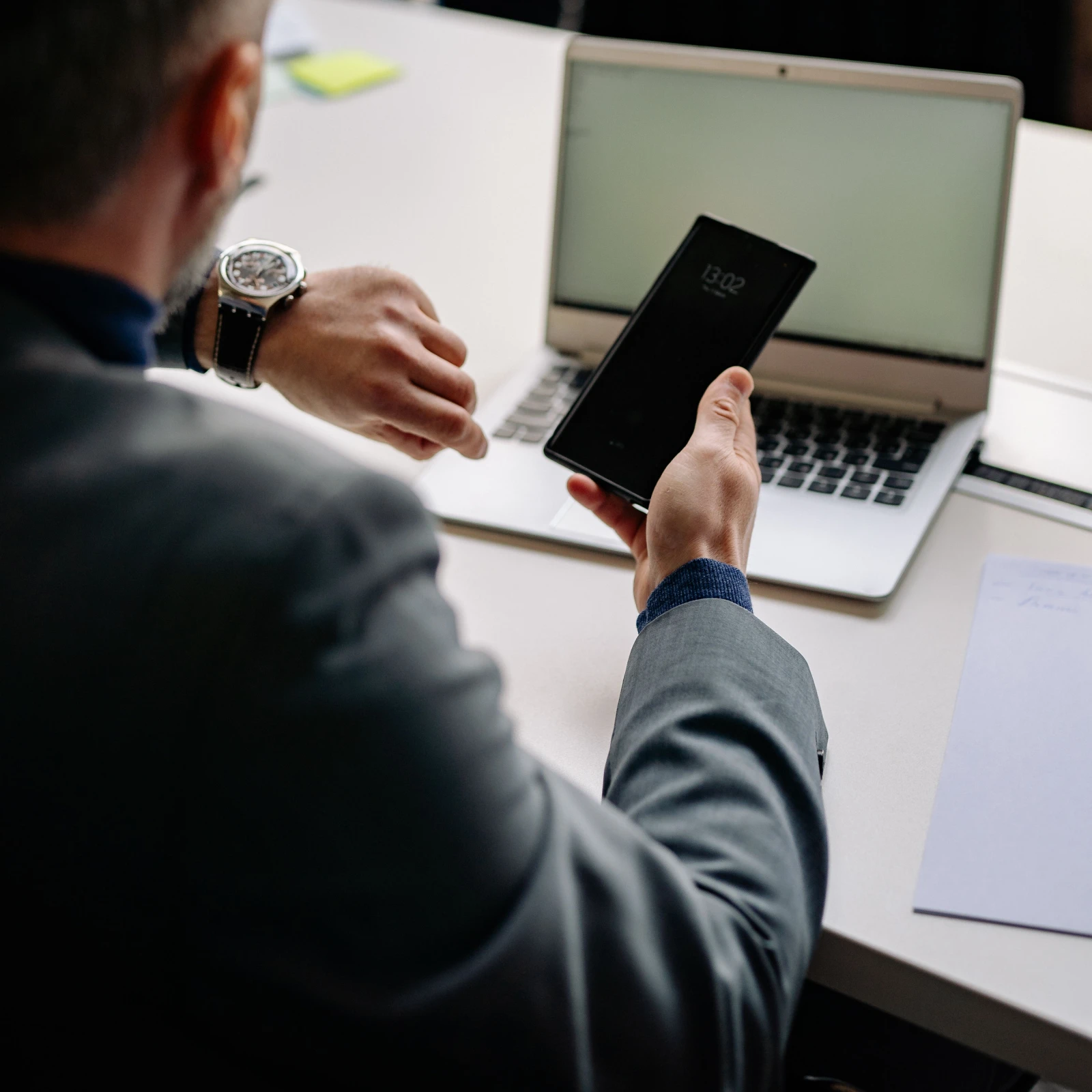 Business professional consulting with a client in a modern office