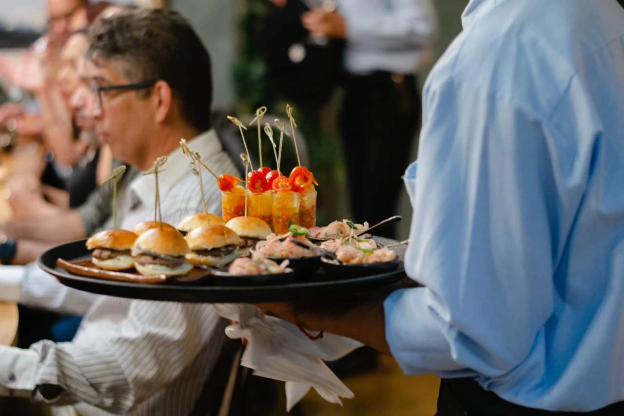 Food and events professional preparing a spread